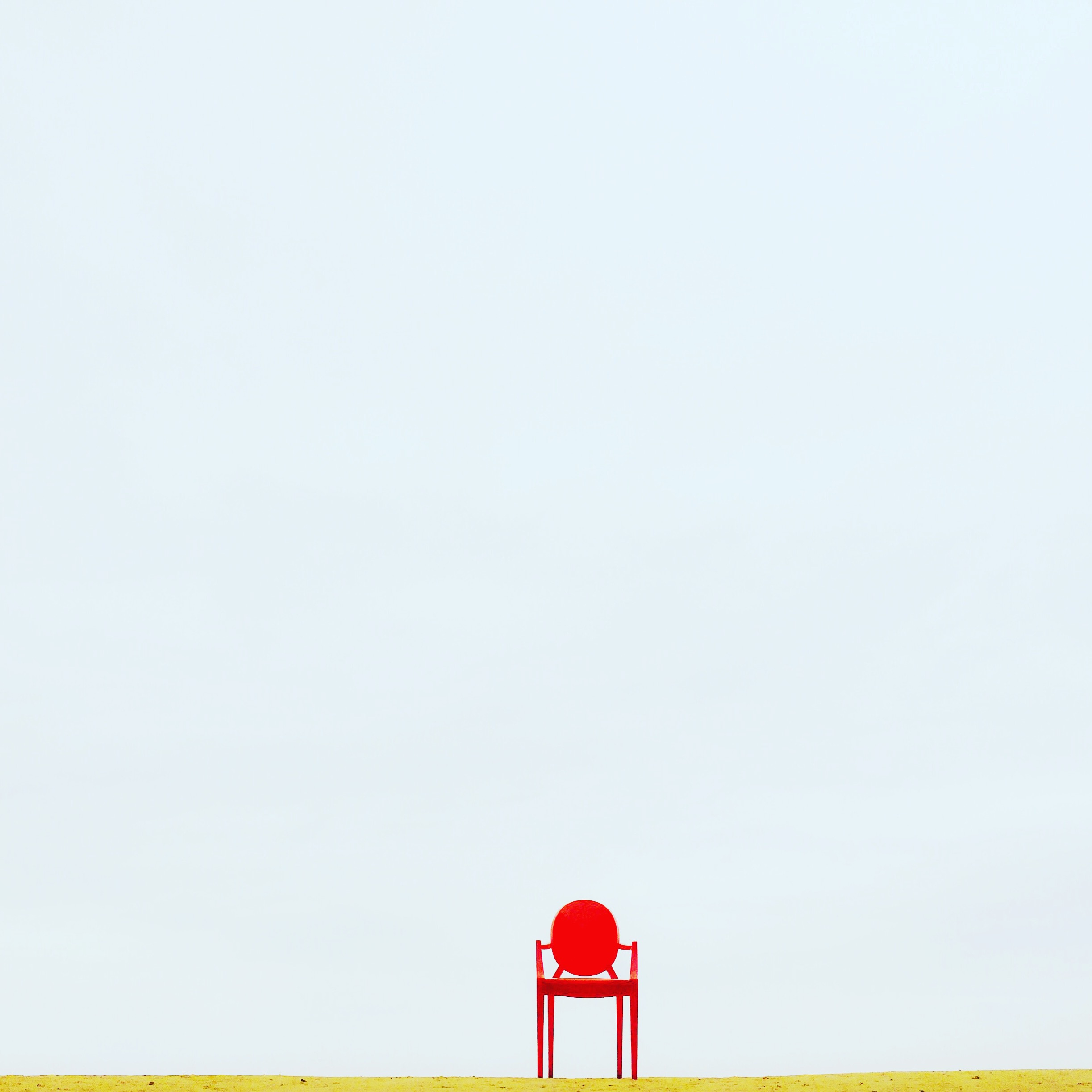 Canva - Red Armchair on Brown Surface
